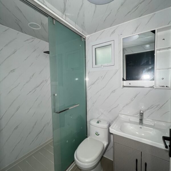20ft Modern Welded Container Home with Kitchen and Bathroom – Grey Wall Panel & White Frame - Image 8