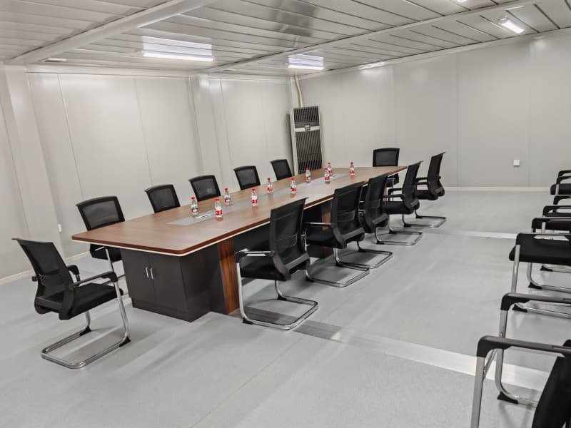 Two-story modular office building meeting room